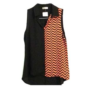 Sleeveless hi-lo chevron top.